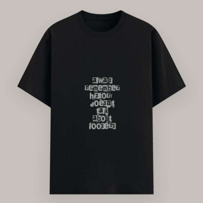 Bold statement quote T-shirt for men and women – history doesn’t talk about losers Color_Black