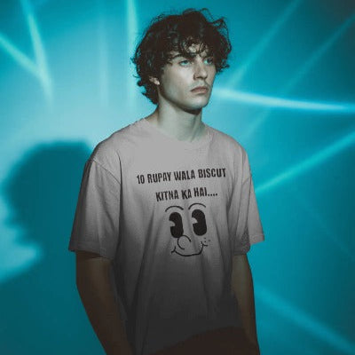 Male model wearing a Grey Melange t-shirt with the viral "10 Rupay Wala Biscuit Kitne Ka Hai" meme printed on the front – casual, funny, and trendy streetwear style