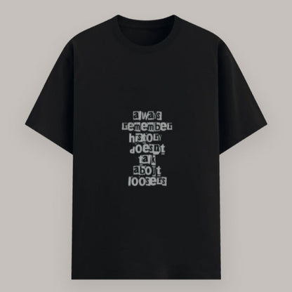 Bold statement quote T-shirt for men and women – history doesn’t talk about losers Color_Black