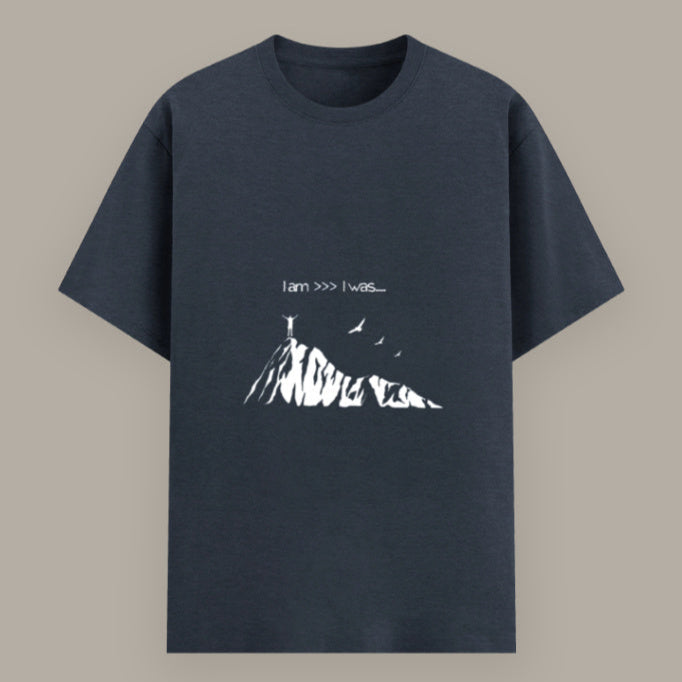 Close-up of “I Am >>> I Was” motivational T-shirt print Color_Navymelange